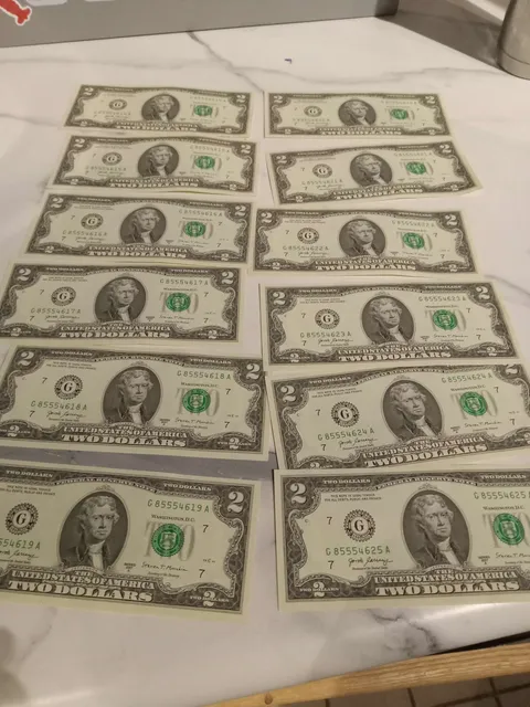 Someone tipped me fresh off the press 2 dollar bills with sequential serial numbers