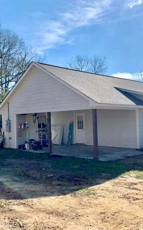 Decided to close in our carport for a third bedroom. Super excited to have more space!