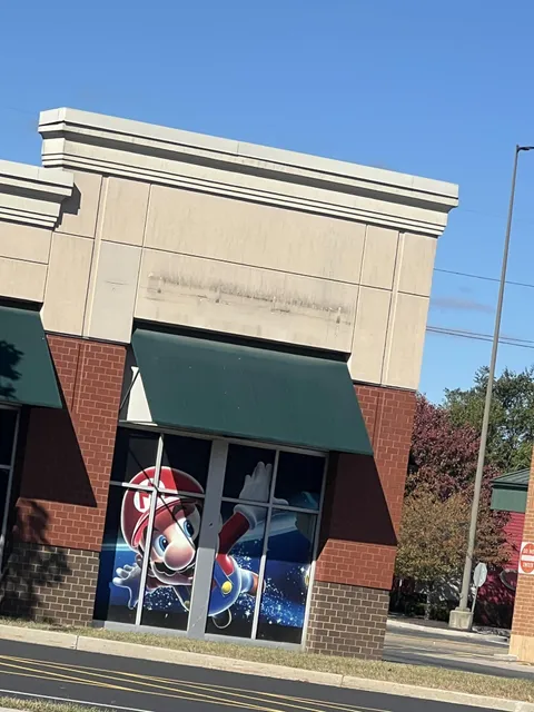 This GameStop never took off its Super Mario Galaxy decoration for the window from 2007, even after it closed down this year it still remains 