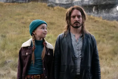 First image of Elijah Wood and Nell Fisher from 'BOOKWORM' - Follows a 12-year-old whose life is turned upside down when her estranged, washed-up American magician father comes to look after her.