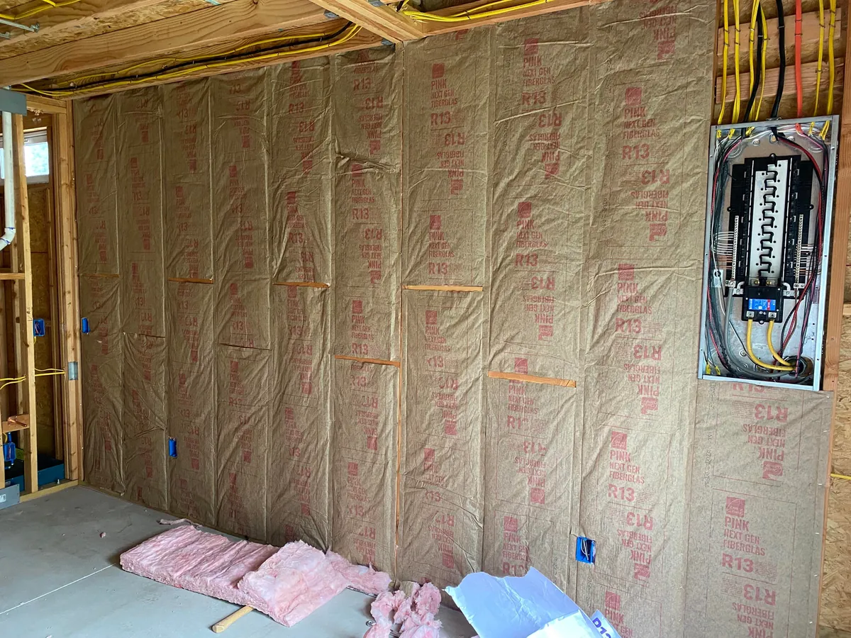 3 year garage/studio apartment build, cost ~$70,000 and one marriage