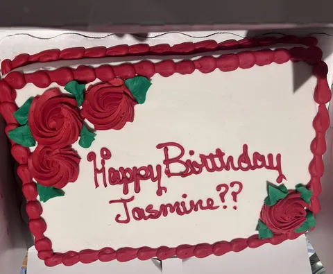 It was supposed to say   "Happy Birthday Jasmine" with a heart. The heart emoji didn't come through on their end.