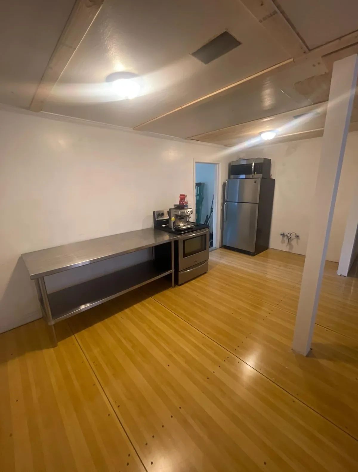 Upcycled some bowling alley lanes for flooring in my renovation project!