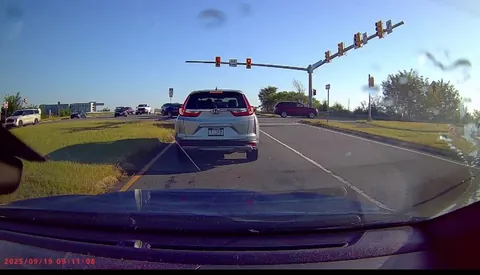 [oc] Driver runs a red light. Convenient cop doesn’t clear the intersection as he follows.