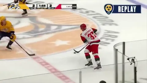 Nashville Predators Joakim Kemell with a huge open ice hit on Hurricanes Andrei Svechnikov.