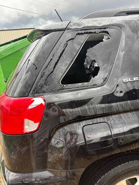 A storm with egg sized hail wrecked my car while at work
