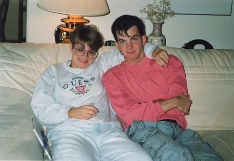 Me and my future wife on her parents' couch, 1991