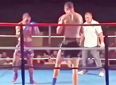 Kickboxer landing a tornado kick