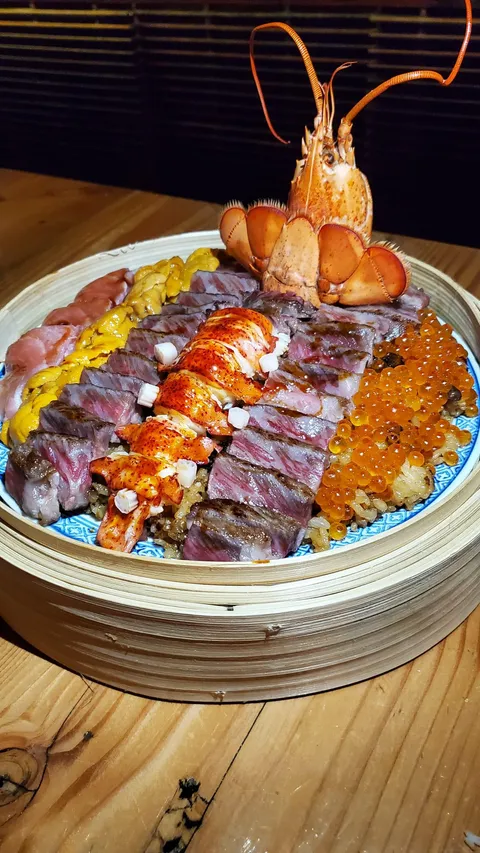 [I ate] Bluefin Otoro, Japanese bafun uni, A5 Wagyu, Lobster, Ikura, on chanterelle sticky rice
