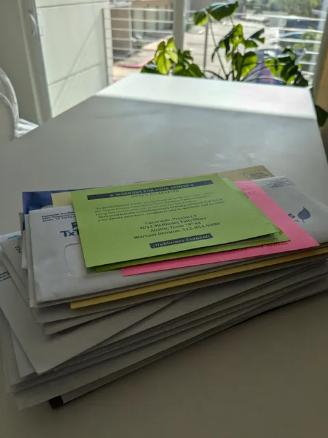 I moved to a new condo and I'm still getting the previous occupant's mail, including unpaid bills, letters from attorneys and banks, and three notices for an arrest warrant 