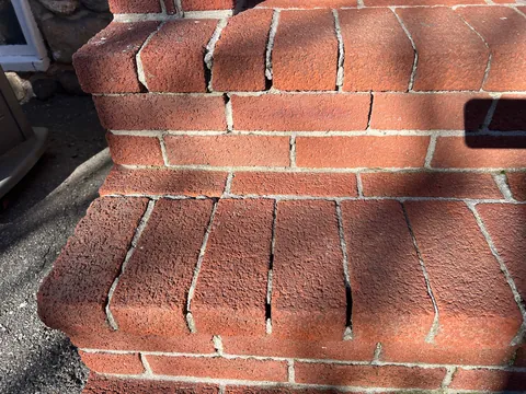 What can I use to fill the   gaps in these bricks?