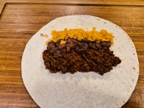 Beef, bean, and rice burritos [Homemade]
