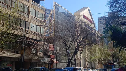 Evangelist church has a fake wall so the building appears to be 3 stories tall