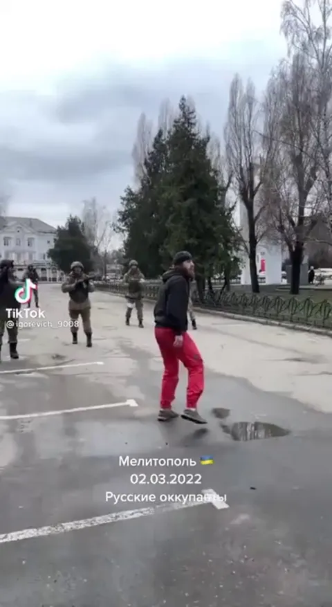 Unarmed people in Melitopol simply give zero fucks and ignore the fact that russian soldiers are shooting over their heads.