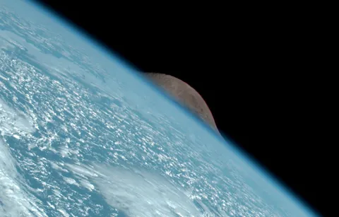 The Moon photobombs a Japanese weather satellite image