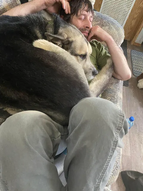 my brother came over to watch sports and my boy got comfy