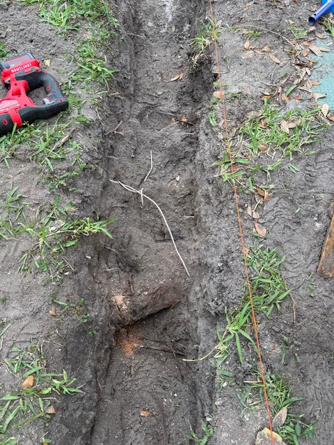 Hurricanes kept flooding my backyard so I buried 140ft of drainage pipe to prevent it.