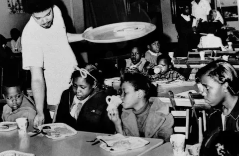 In 1969, the Black Panthers launched free breakfast programs across the US, feeding thousands of kids before school. The FBI called it a threat. In some cities, police raided kitchens, smashed food, and urinated on supplies to shut them down.