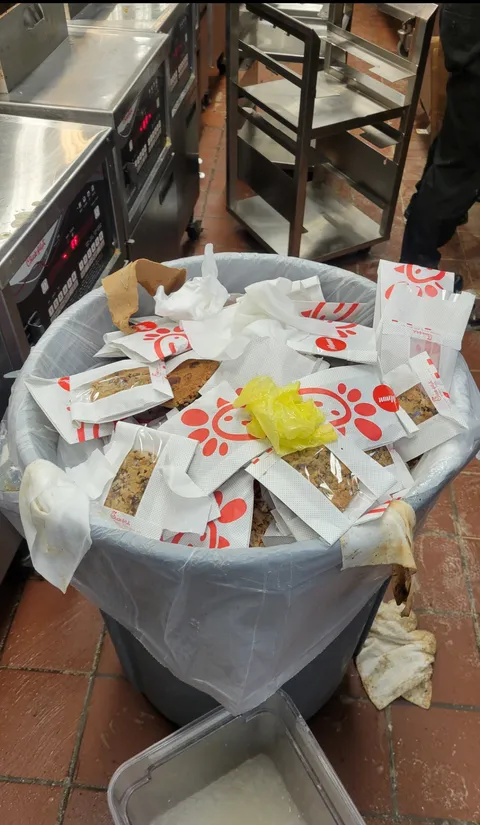 The manager would throw away cookies every Saturday instead of giving them to the employees