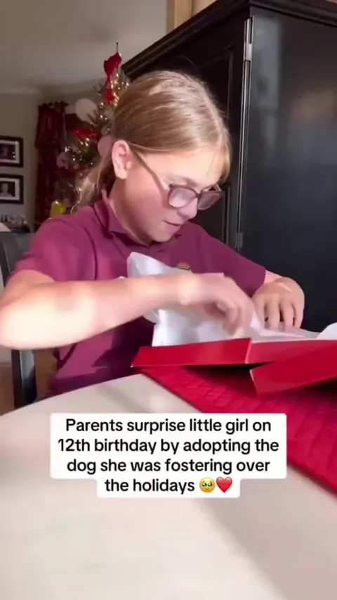 Parents surprise little girl on 12th birthday by adopting the dog she was fostering over the holidays.