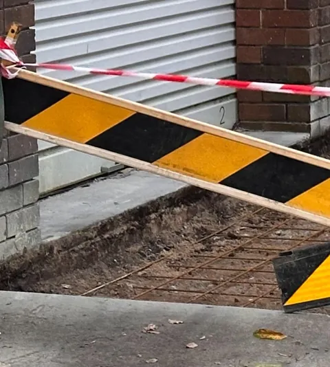 [Update] The hole is filled in, now waiting for the concrete to dry to get my car out