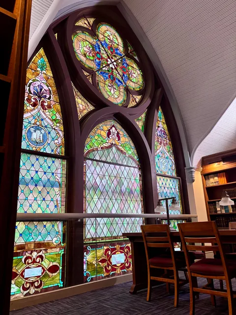 Reading under stained glass at my local library