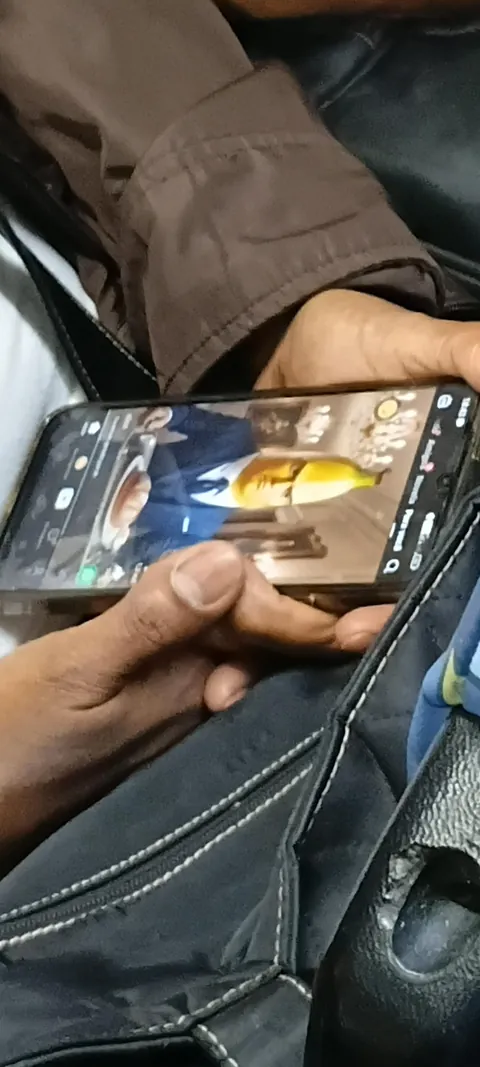 Someone is watching an AI slop fruit soap opera on the bus without head phones