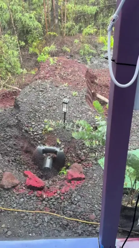 Septic Tank coming out of the ground in Hilo, Hawaii during the Lala Tropical Storm