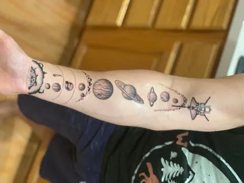 Proud of my latest tattoo. Voyager has always been my favorite spacecraft!