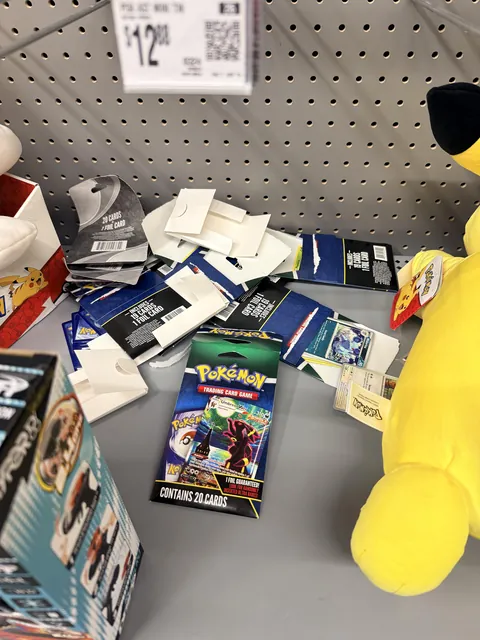 Opening packs of Pokémon cards without paying for them.
