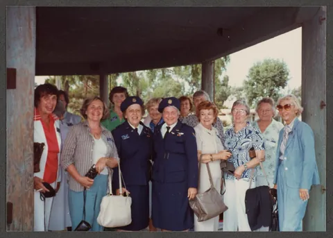 Photos of a group of WASP (Women Airforce Service Pilots) veterans posing together at their 1984 reunion in San Diego, CA