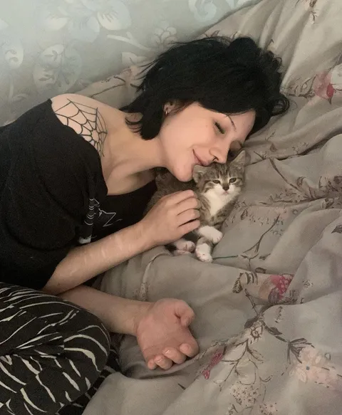 My new kitten and I 🖤