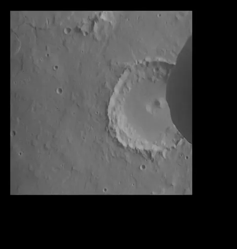 Phobos photobombs Mars (Credit: ESA/j. Roger)