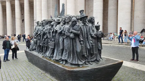 This statue at St. Paul's Square shows how accepting immigrants is a core tenet of Catholicism.