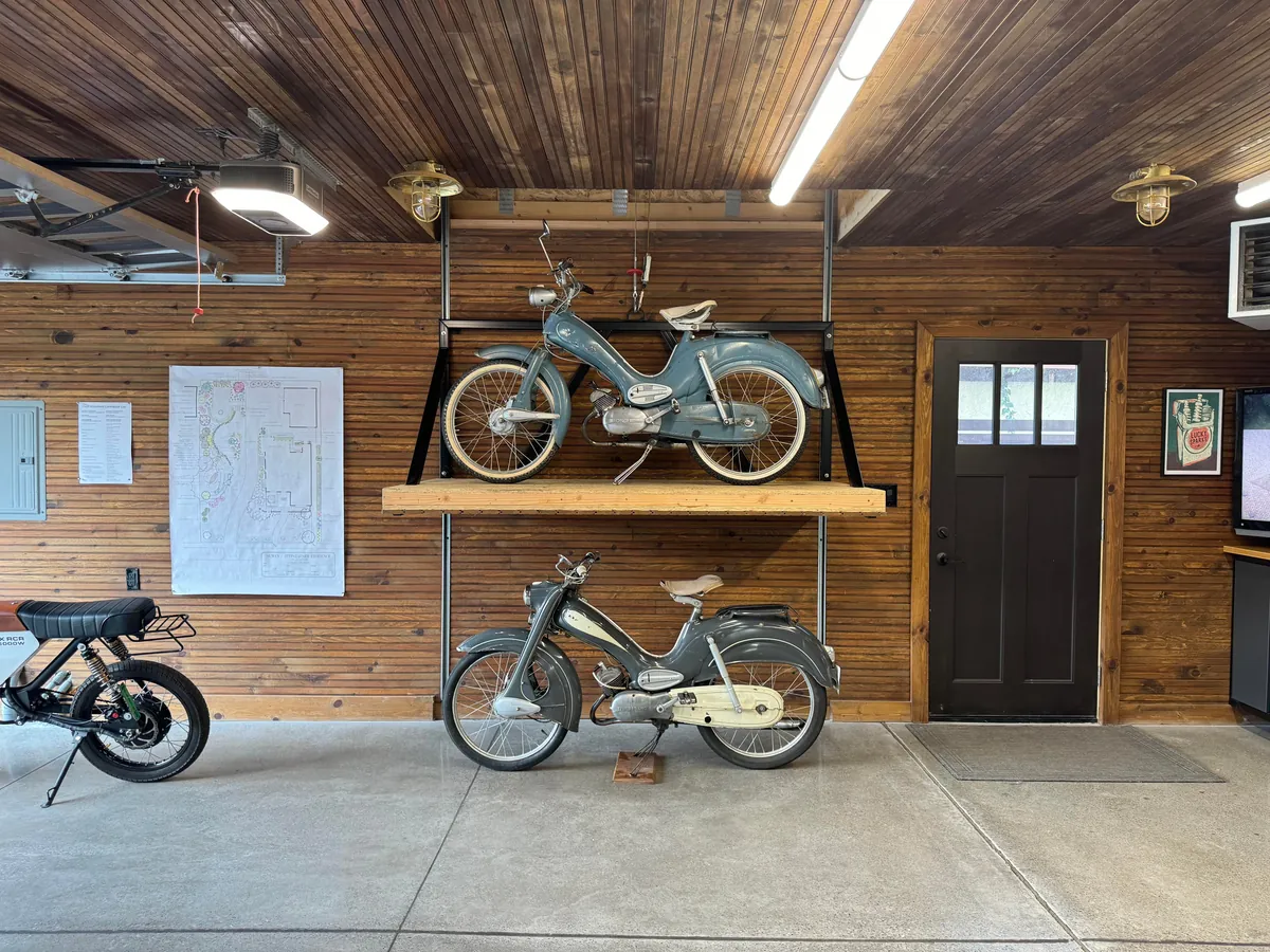 Just had the time to Spring Clean and since we finally finished the concrete floors and got cabinetry installed, I wanted to share! Here is our new, 1920s-styled garage in Detroit with a custom attic elevator, our architectural drawings and images of the original 1927 garage we replaced.