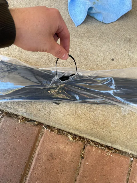 I thought this was well known untill my father who has been a mechanic for 30 years had not seen it before.. open your cable tie packets in the middle and you will never spill them all over the floor again. Pull out however many you need from the centre as seen below.
