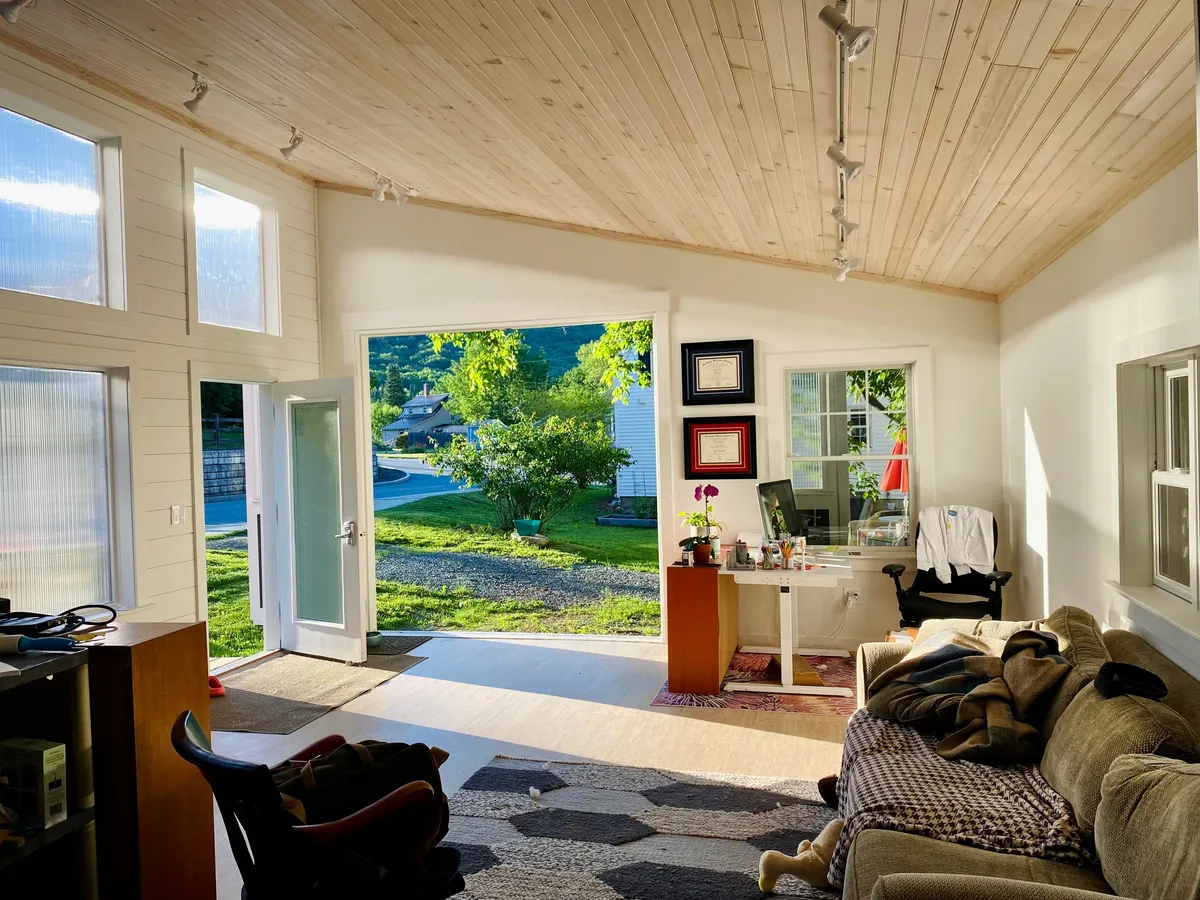 I built a 500 sq ft backyard shed studio for my photography business. I personally handled every phase from design to completion except for concrete, electrical, and HVAC. It's insulated and comfortable year round here in New Hampshire.  Ask me anything!