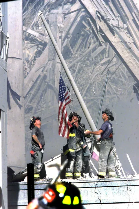 That Star Spangled Banner yet waved, and America yet stood.