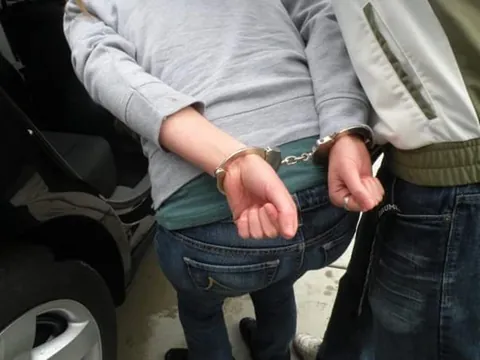 Some palms out handcuffs