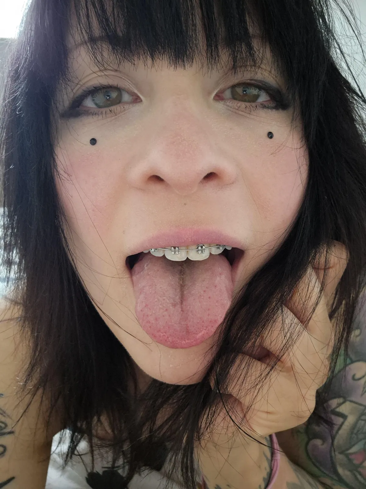 Tongue out Helping you aiming for my braces