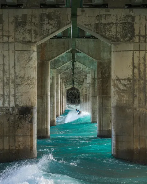 ITAP of a surfer under a bridge, Okinawa Japan.