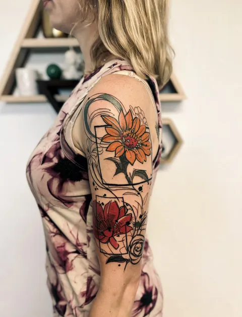 Illustrative flowers tattoo by James Lafleur of nova tattoo and art Colorado