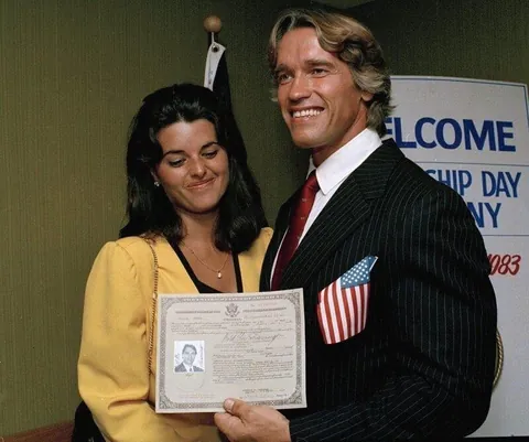 Arnold Schwarzenegger showing off his American citizenship, 1983.