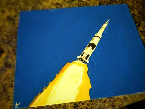 I started painting recently to help fight my anxiety, and tonight I painted a Saturn V. What do you think?