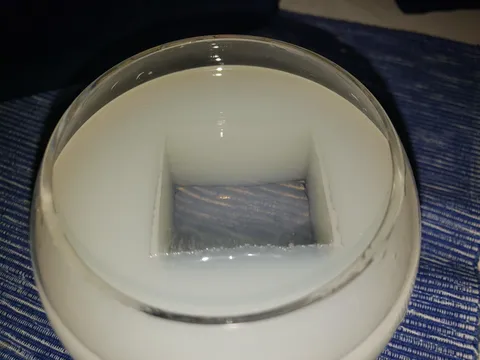 The clear ice in my Absinthe looks like a chunk was cut out of it.