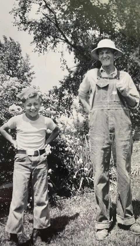 My grandpa (11) and his grandfather (70) posing in the garden in 1945