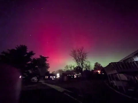 Aurora Borealis is visible in Iowa right now. This is the first time I've seen it.
