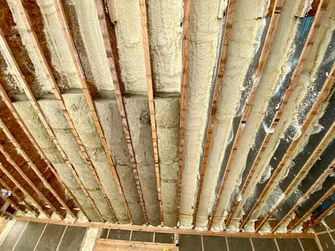 I built a 500 sq ft backyard shed studio for my photography business. I personally handled every phase from design to completion except for concrete, electrical, and HVAC. It's insulated and comfortable year round here in New Hampshire.  Ask me anything!