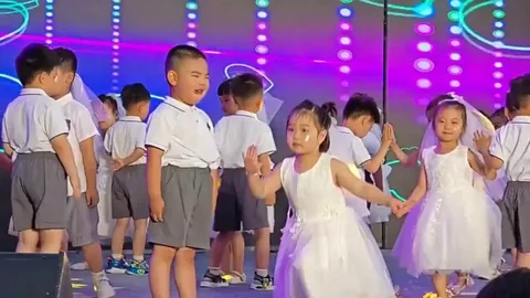 Little girl performs by herself