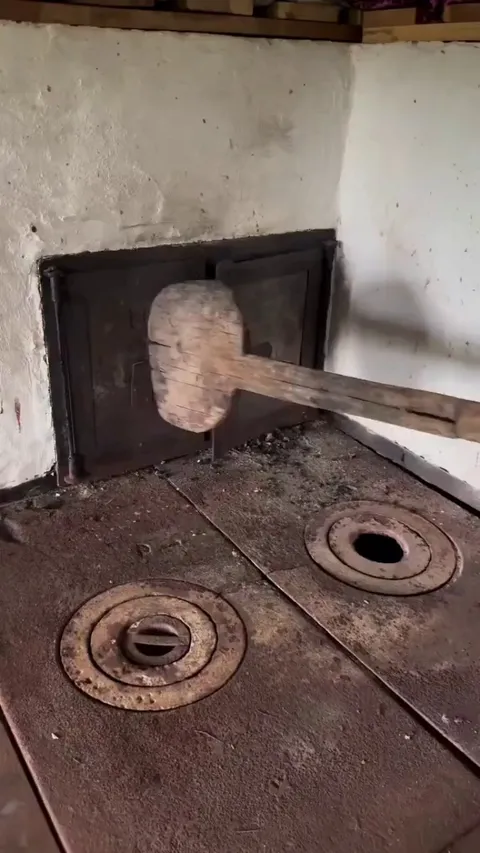 Baking bread in a nearly 200 year old oven in Romania